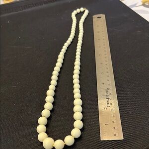Vintage cream graduated beads with gold tone spacers